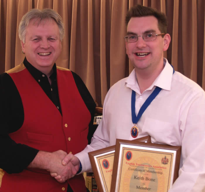 Toastmaster training course completed, London Toastmaster Keith Bone receiving his certificates for training and membership of The English Toastmasters Association